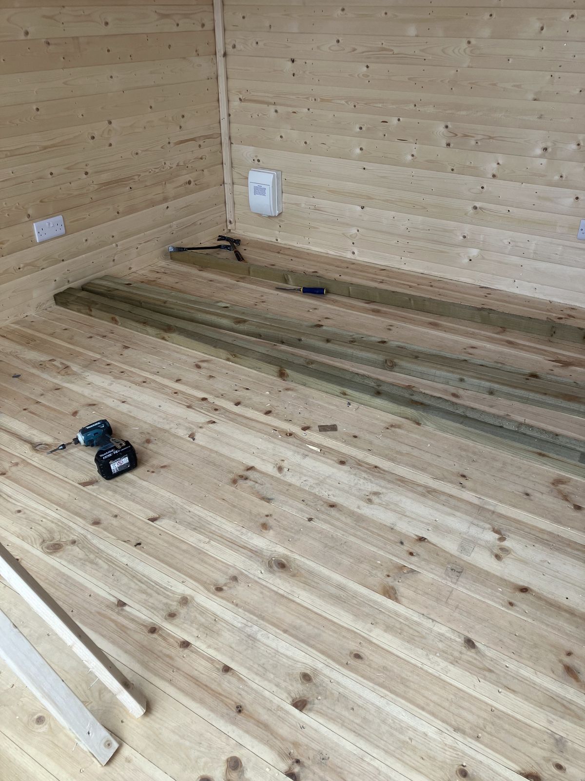 Floor Insulation and LVT Flooring in a Garden Cabin — gallery photo