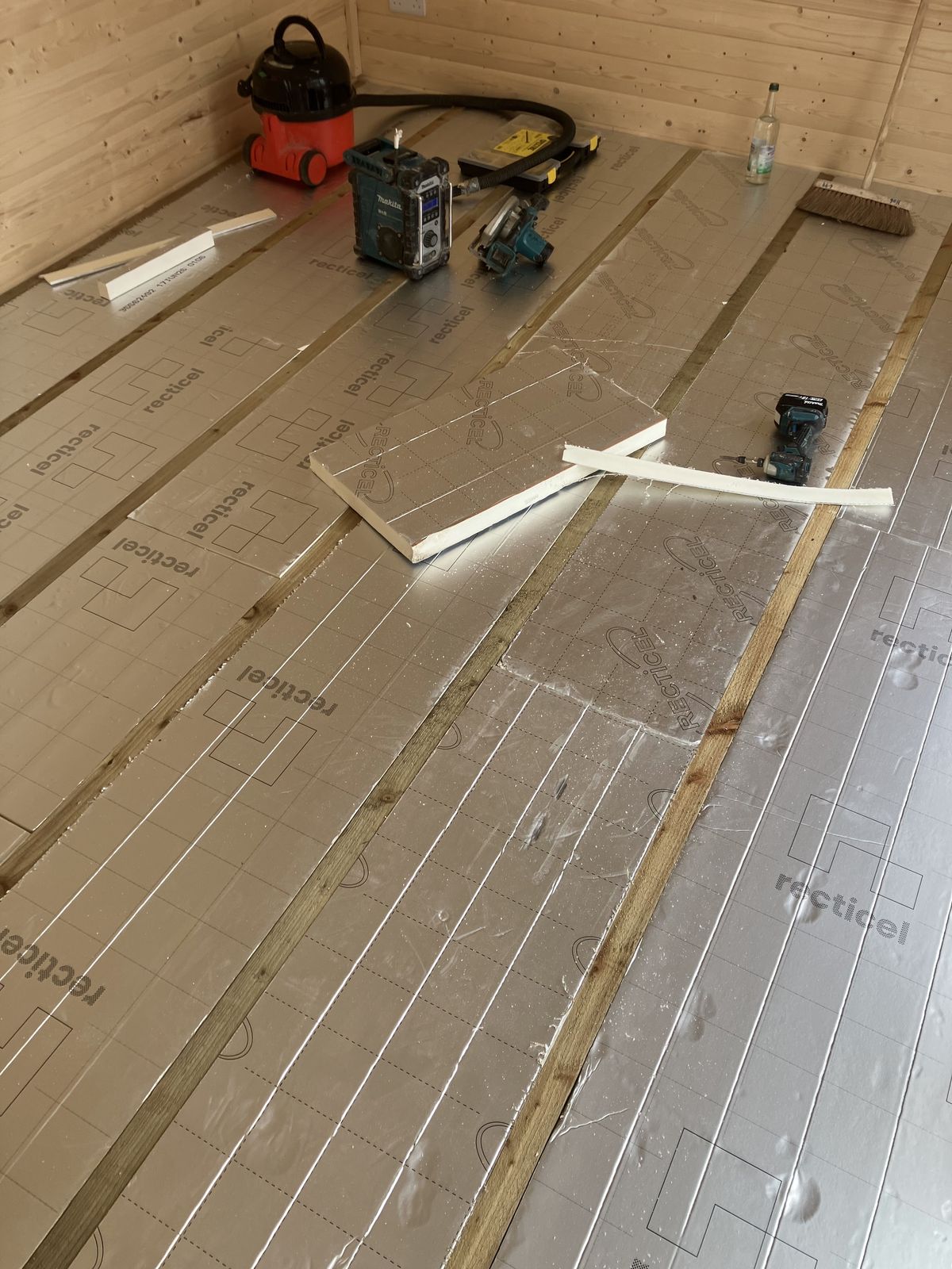 Floor Insulation and LVT Flooring in a Garden Cabin — gallery photo