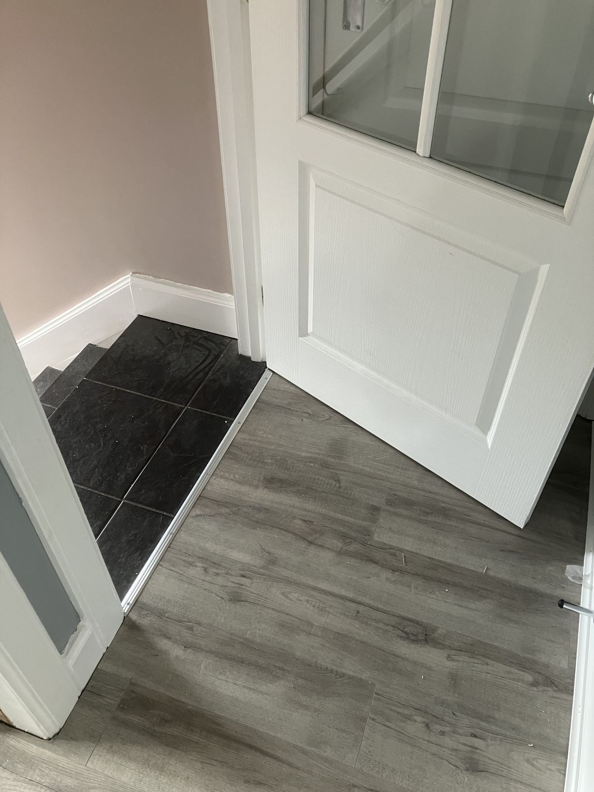 Grey Laminate Through the Hall and Rooms — gallery photo