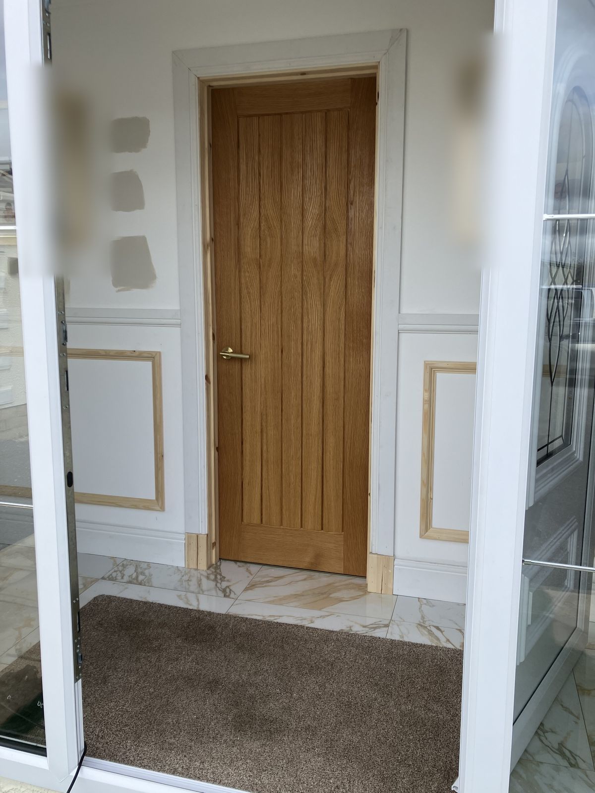 Oak Doors, Hall Panelling and a Render Repair — gallery photo