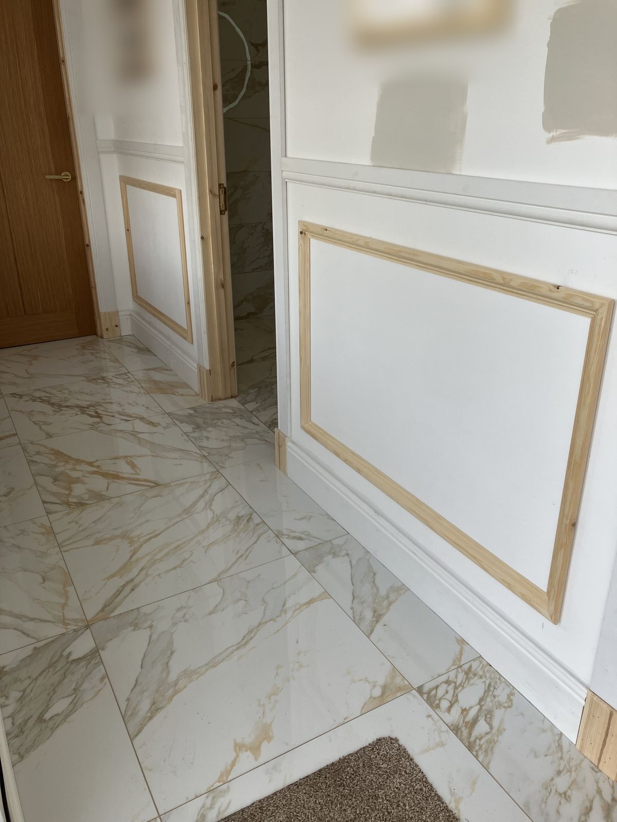 Oak Doors, Hall Panelling and a Render Repair — gallery photo
