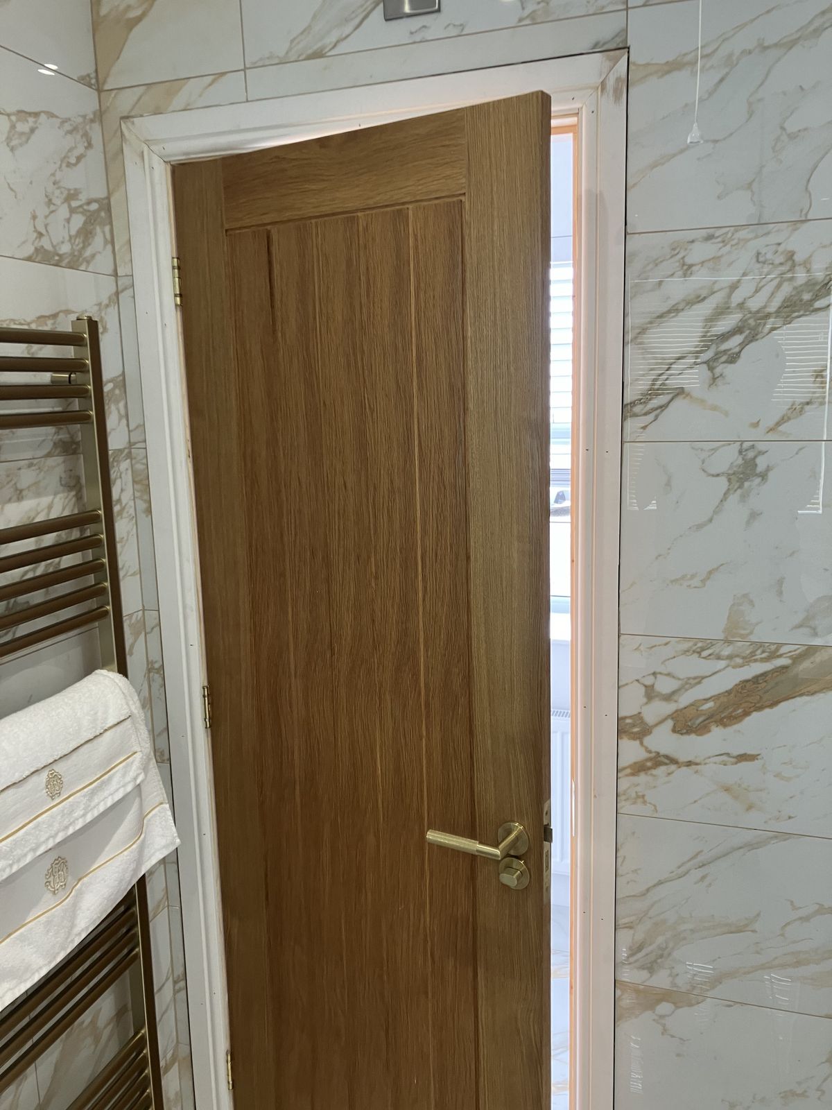 Oak Doors, Hall Panelling and a Render Repair — gallery photo