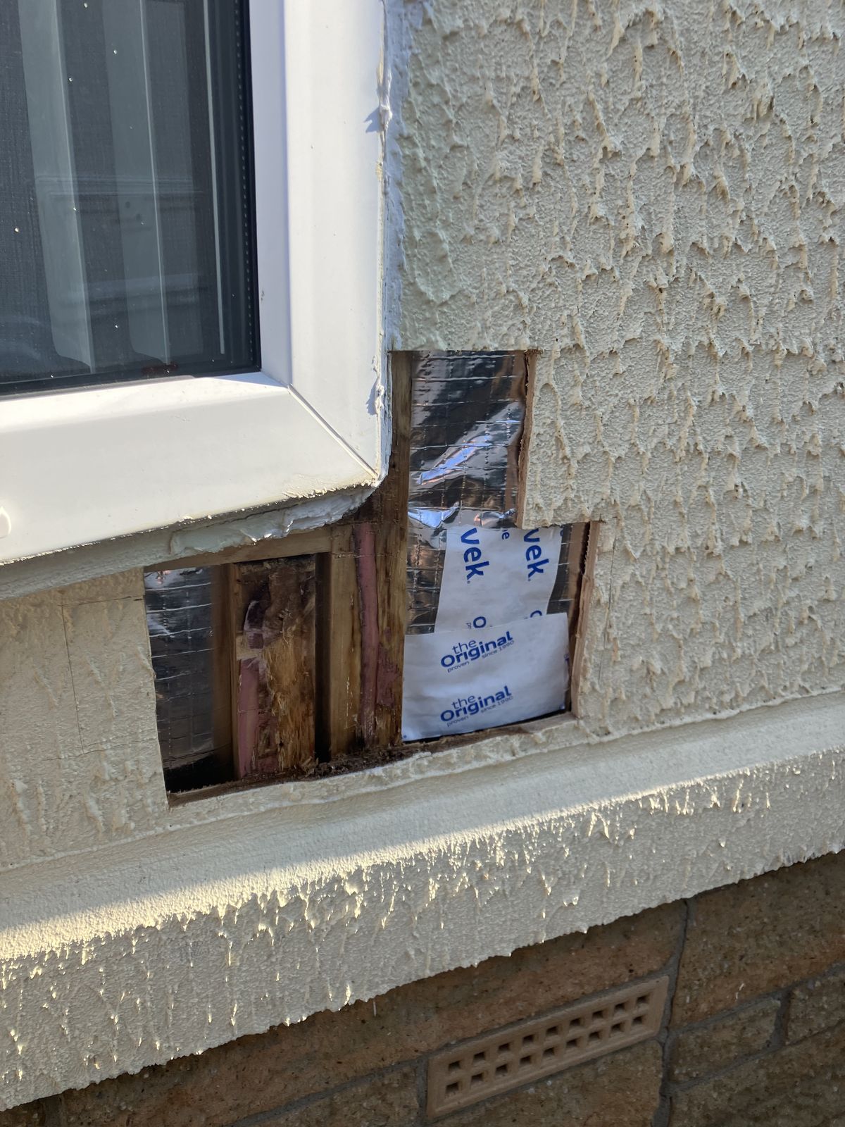 Oak Doors, Hall Panelling and a Render Repair — gallery photo