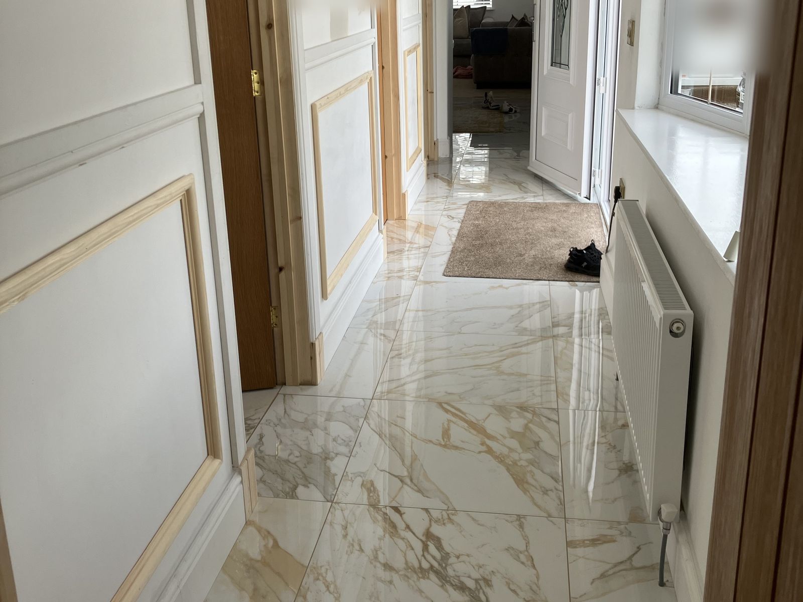 Oak Doors, Hall Panelling and a Render Repair — finished work in Lanarkshire