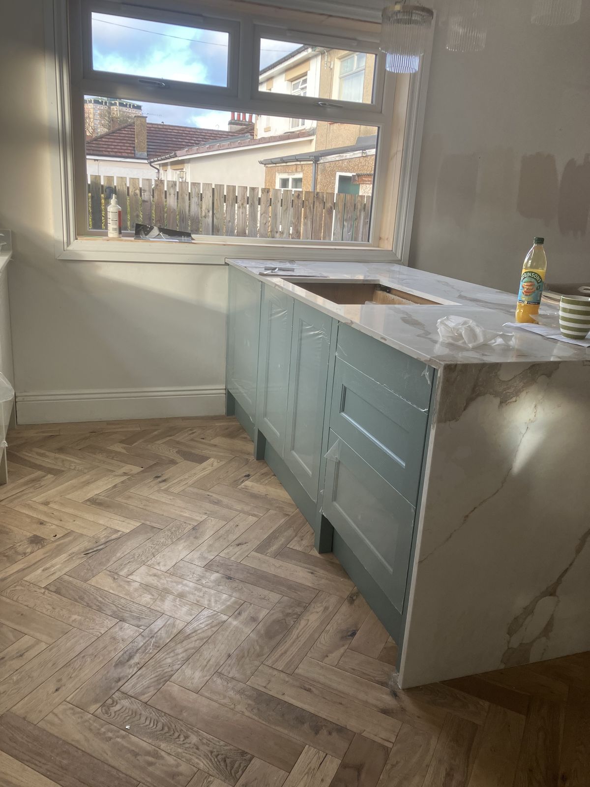 Two-Tone Shaker Kitchen with a Waterfall Island — gallery photo