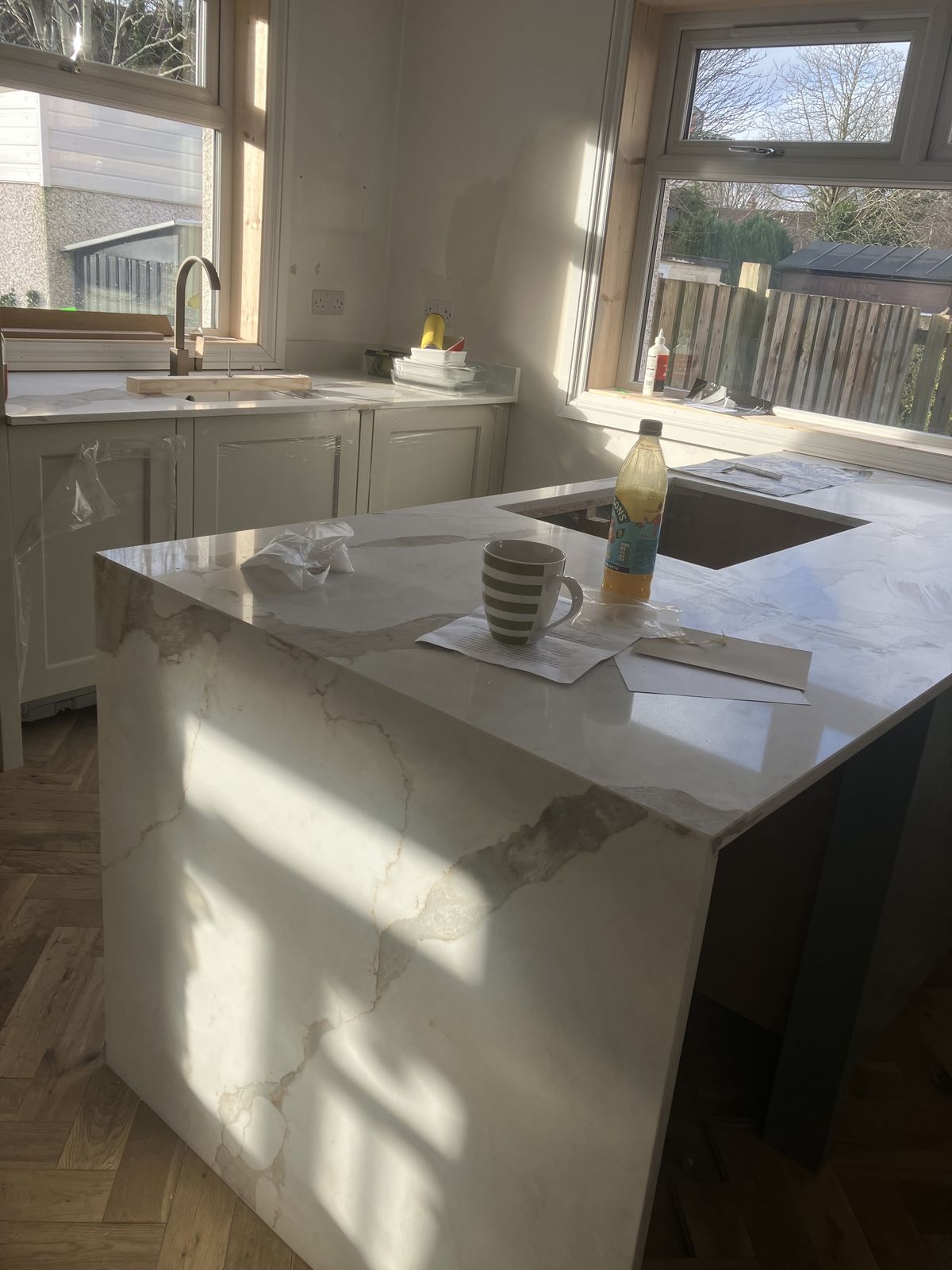 Two-Tone Shaker Kitchen with a Waterfall Island — gallery photo