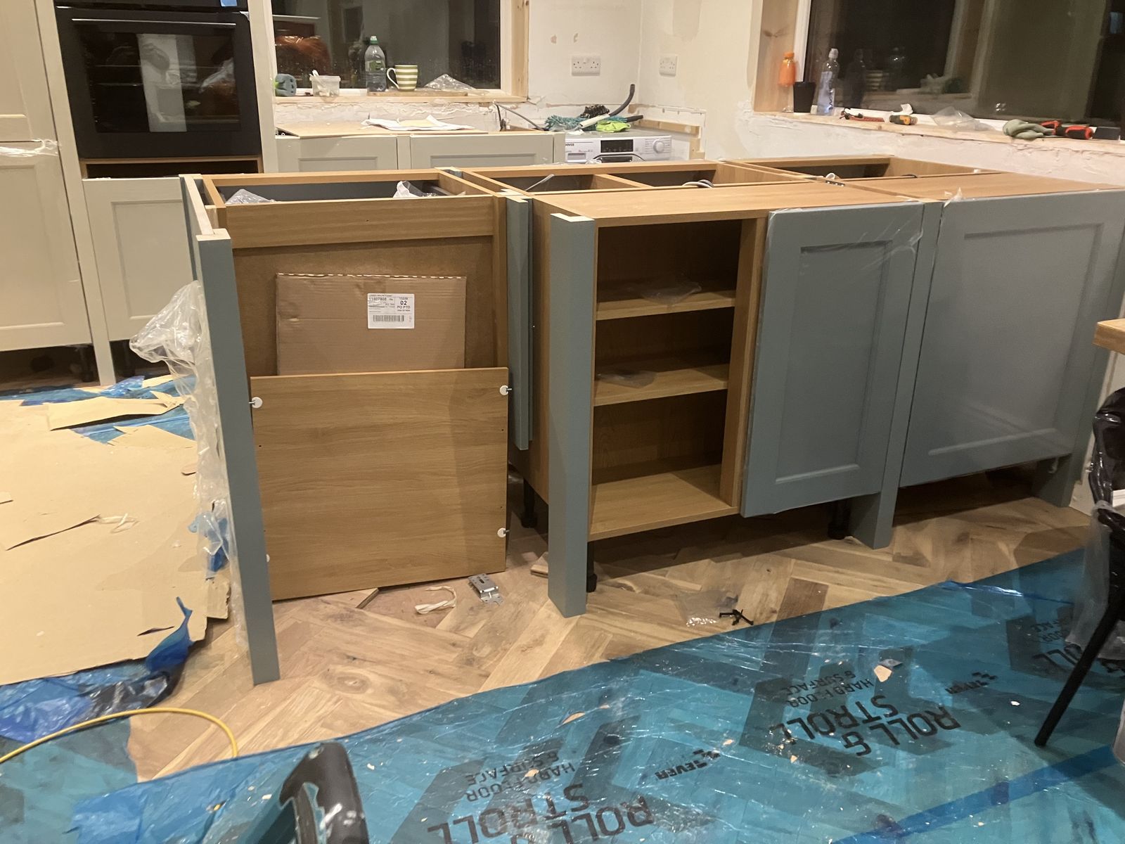 Two-Tone Shaker Kitchen with a Waterfall Island — gallery photo