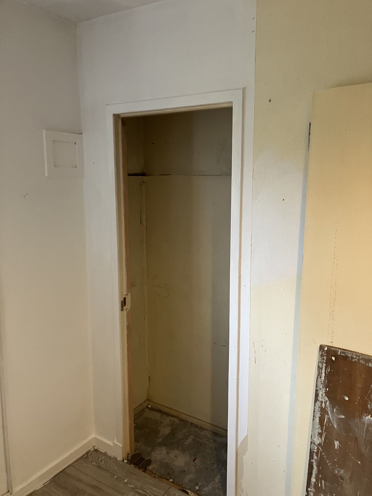 Shelves and a Hanging Rail in a Built-In Cupboard — gallery photo