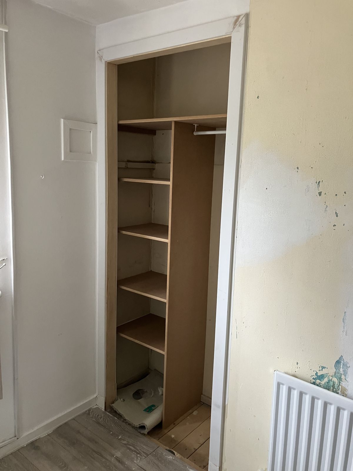 Shelves and a Hanging Rail in a Built-In Cupboard — Lanarkshire