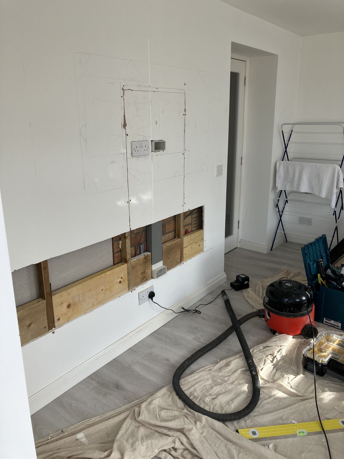 Slat Media Wall with a Floating TV Unit — gallery photo