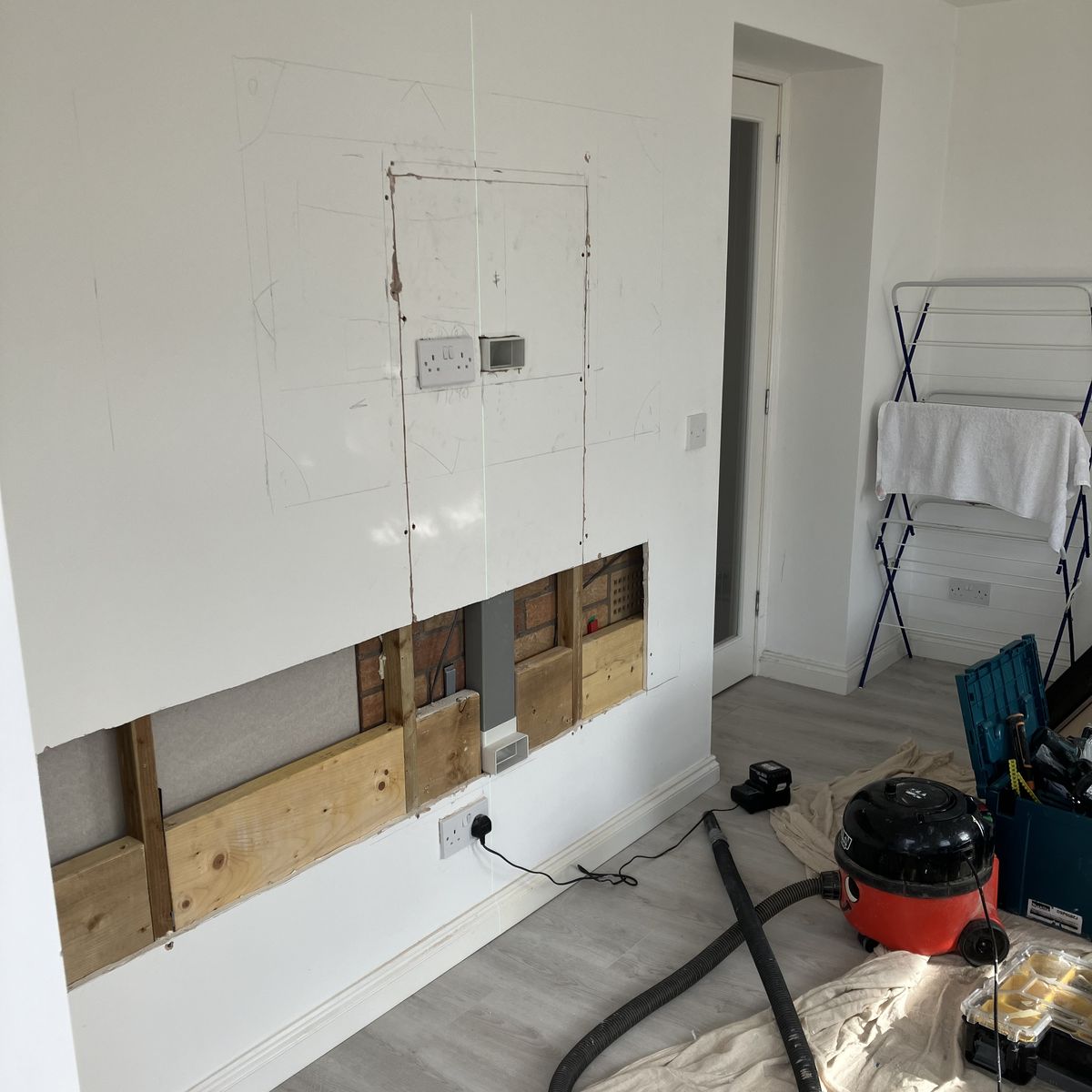 Before: Slat Media Wall with a Floating TV Unit in Lanarkshire